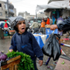 A young boy sells vegetables in Gaza in 2010.